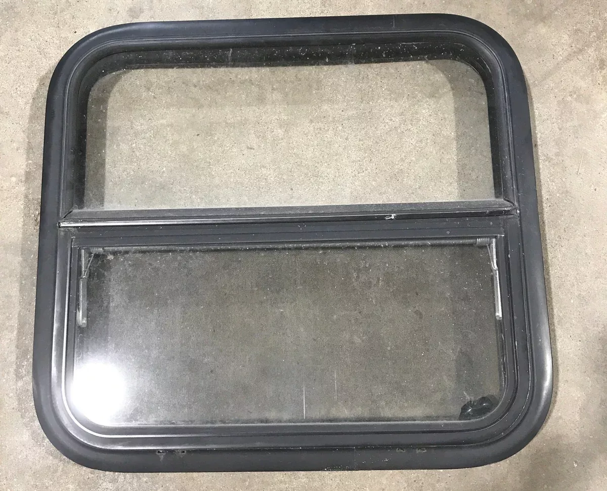 Used Black Radius Opening Window : 23 1/2 ” W X 21 1/4 ” H X 2 ” D