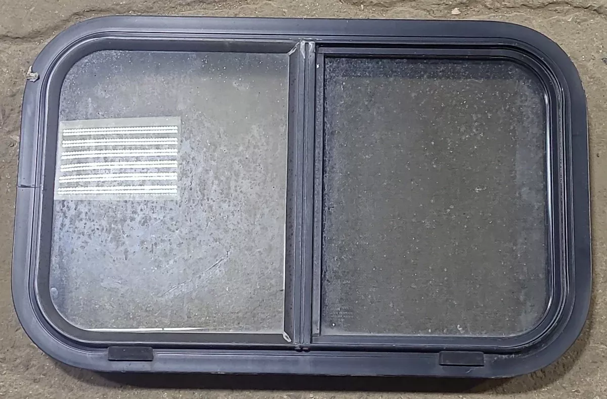Used Black Radius Opening Window : 24 1/2 ” W x 15 ” H x 1 7/8 ” D
