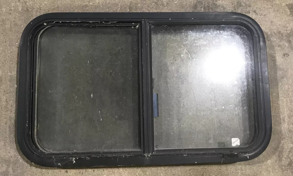 Used Black Radius Opening Window : 30 3/4 ” W X 18 1/2 ” H X 2 ” D