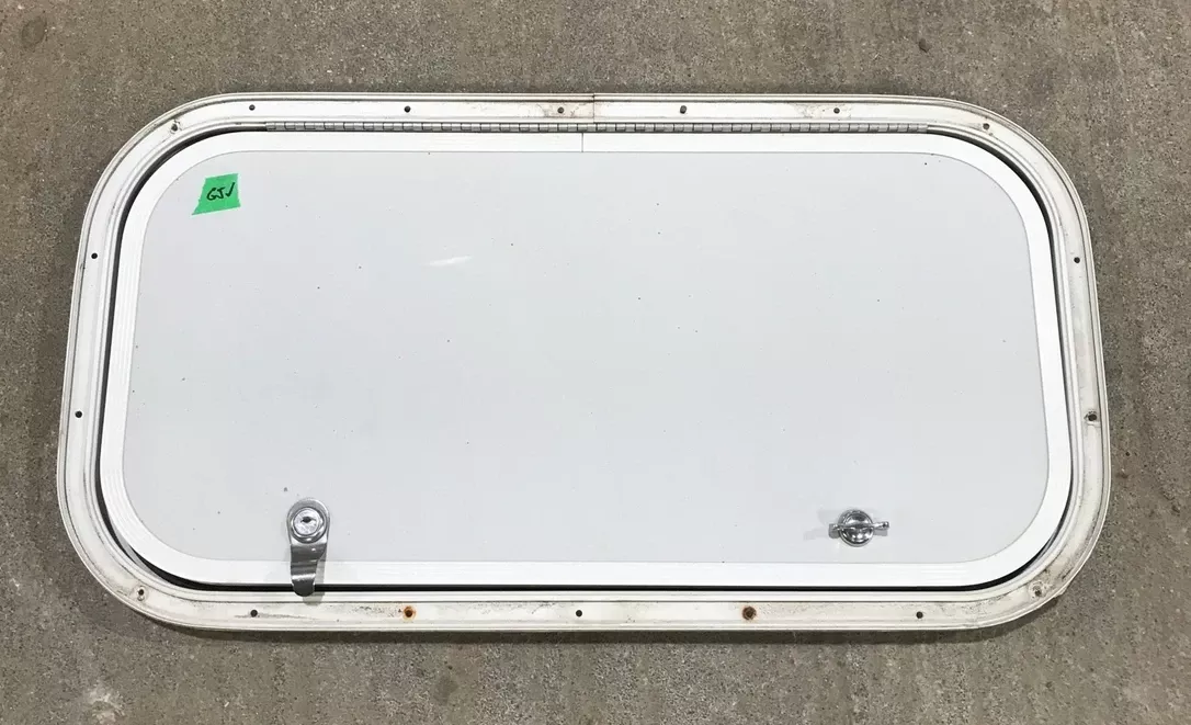 Used Radius Cargo / compartment Door 23 1/2 ” W x 11 1/2 ” H