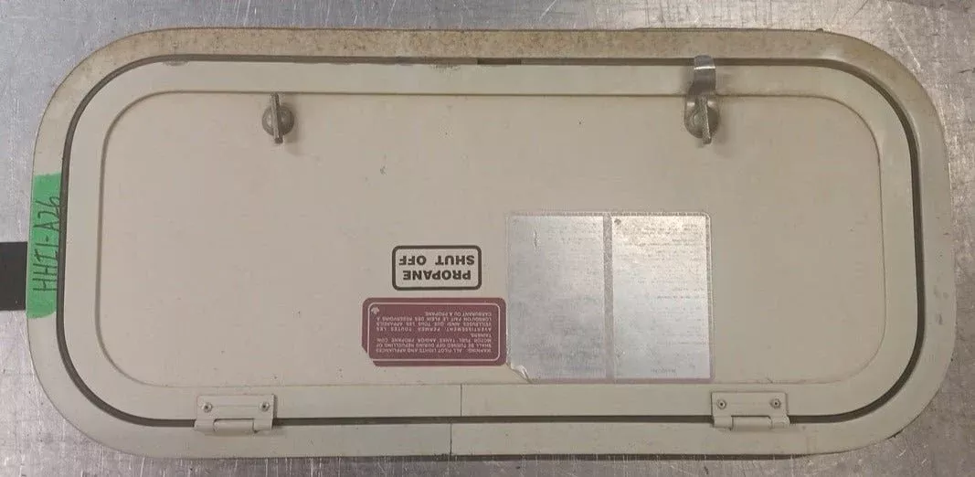 Used Radius Cornered Battery/Propane Cargo Door 22 3/4 ” x 9 1/2 ” x 1 1/4 “D