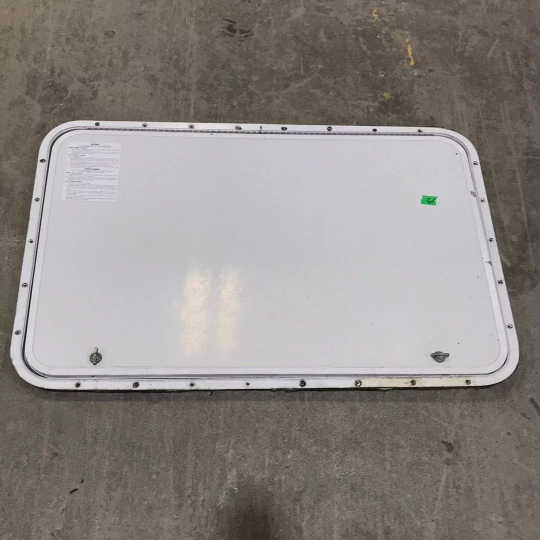 Used Radius Cornered Cargo Door 35 3/4 ” W x 23 1/2 ” H x 5/8 ” D